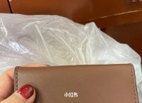 [寇驰钱包怎么看真假]怎么鉴定蔻驰钱包真假
